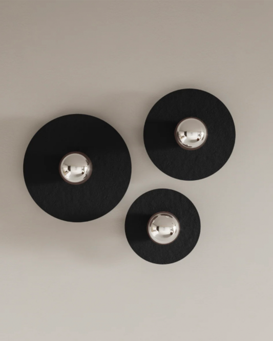 Troika wall lamp with three harmonious elements creating warm decorative glow مصباح جداري ترويكا بثلاثة عناصر متناغمة تضفي توهجاً زخرفياً دافئاً