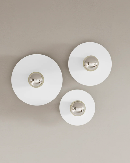 Troika wall lamp with three harmonious elements creating warm decorative glow مصباح جداري ترويكا بثلاثة عناصر متناغمة تضفي توهجاً زخرفياً دافئاً