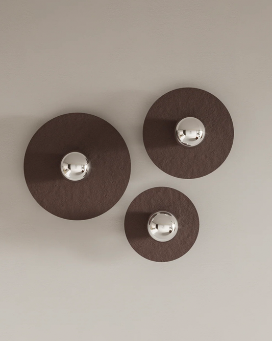 Troika wall lamp with three harmonious elements creating warm decorative glow مصباح جداري ترويكا بثلاثة عناصر متناغمة تضفي توهجاً زخرفياً دافئاً