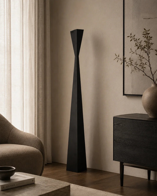 Aura Floor Lamp in a styled interior | لمبادير أورا، داخل مساحة منسقة، إضاءة بتصميم رفيع