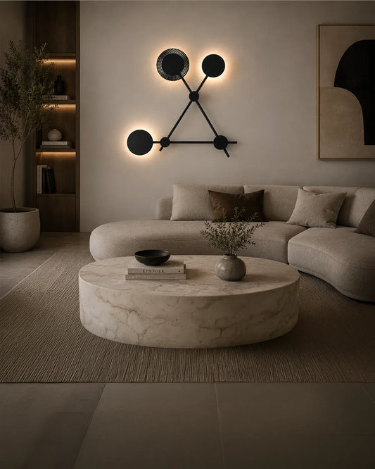 Trio Wall Lamp in a styled interior, wall lamp with three circles arranged in a balanced composition (view 1) | أبليك تريو، داخل مساحة منسقة، ثلاث دوائر