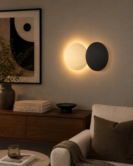 Twin Wall Lamp in a styled interior, wall lamp with two circles arranged in dialogue | أبليك توين، داخل مساحة منسقة، دائرتان بإضاءة خلفية