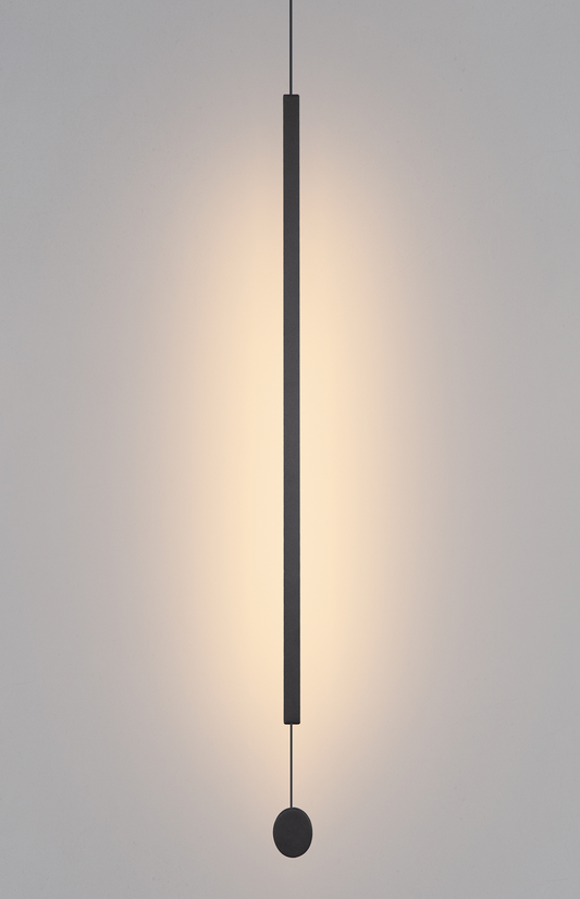 Lines pendant light with slim vertical black design creating warm ambient lighting / إضاءة معلقة بتصميم خطي نحيف باللون الأسود تضيف إضاءة دافئة ولمسة عصرية