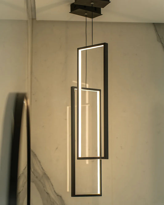 Bound Pendant product photograph, pendant with a composed form built around a warm glow (image 2) | دلاية باوند، بتشطيب أسود