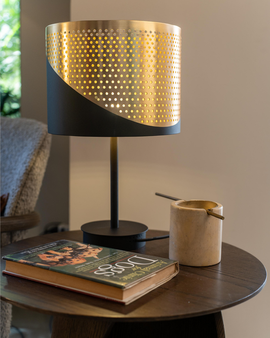Dip table lamp with modern electroplated finish creating soft ambient light – مصباح طاولة بتشطيب معدني عصري يمنح إضاءة محيطية ناعمة