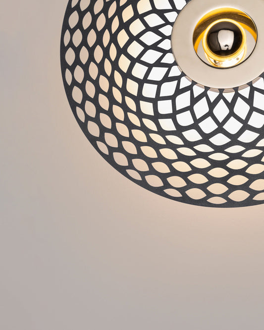 Globe wall lamp with spherical design creating a soft ambient glow / مصباح حائط كروي بتصميم عصري يوزع إضاءة هادئة داخل المساحة