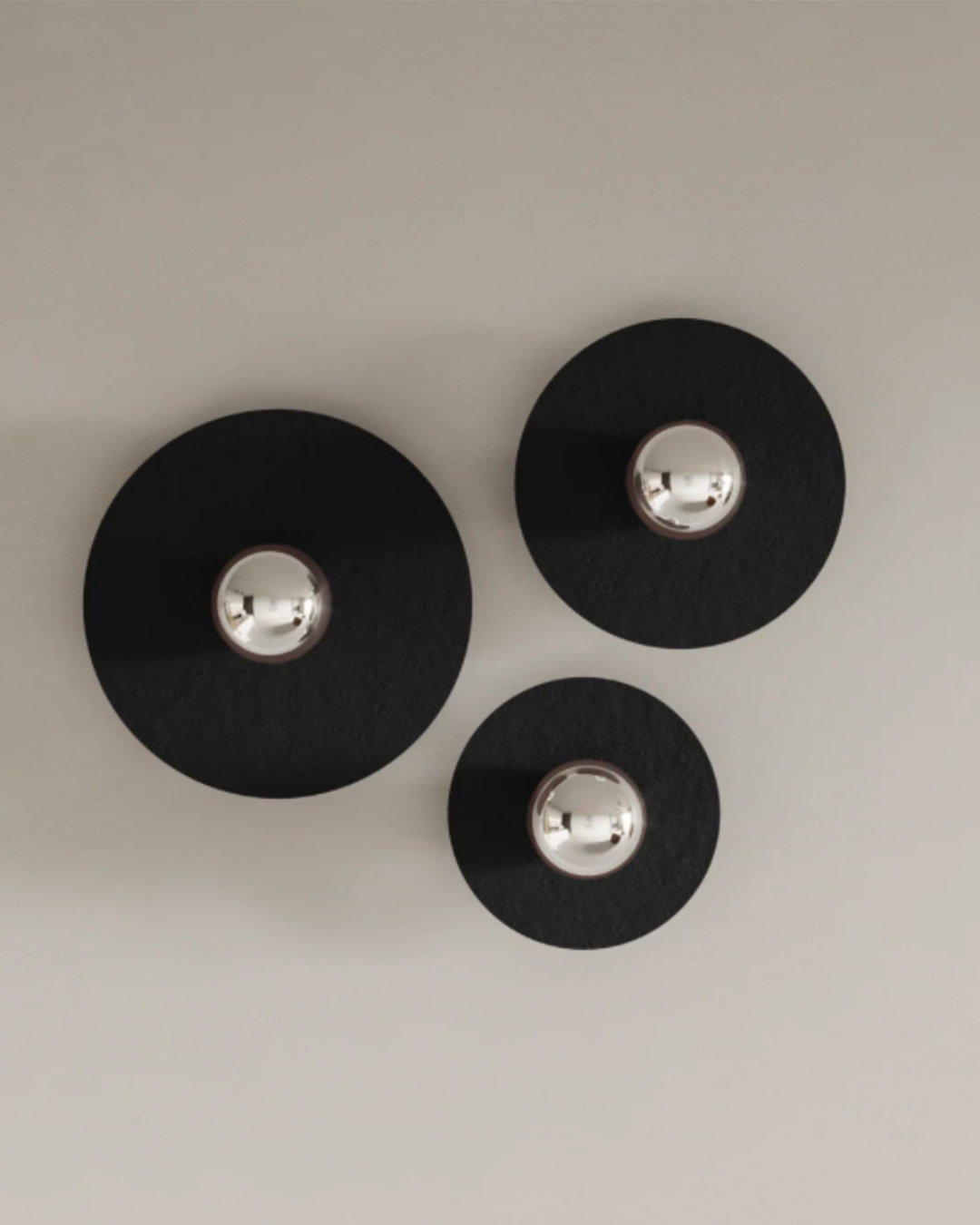Troika wall lamp with three harmonious elements creating warm decorative glow مصباح جداري ترويكا بثلاثة عناصر متناغمة تضفي توهجاً زخرفياً دافئاً