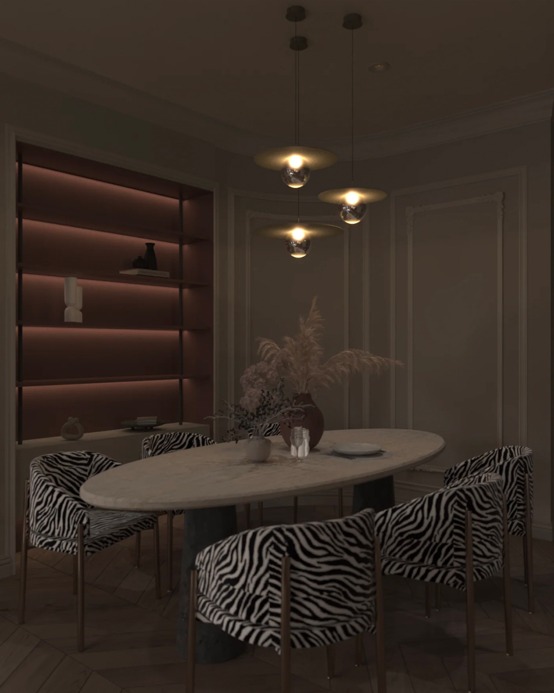 Troika pendant light with three decorative hanging elements creating ambient glow مصباح معلق ترويكا بثلاثة عناصر زخرفية مضيئة بتوهج محيطي