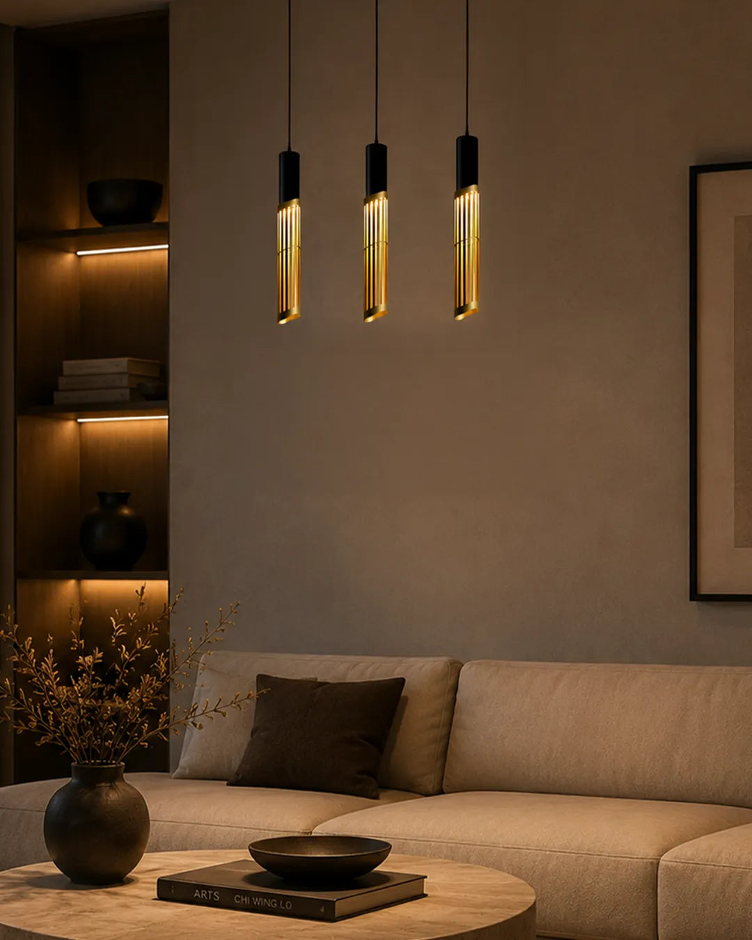 Dew 3 Pendant in a styled interior, pendant with the form and rhythm of dew drops | دلاية ديو 3، داخل مساحة منسقة، ثلاث قطرات مضيئة