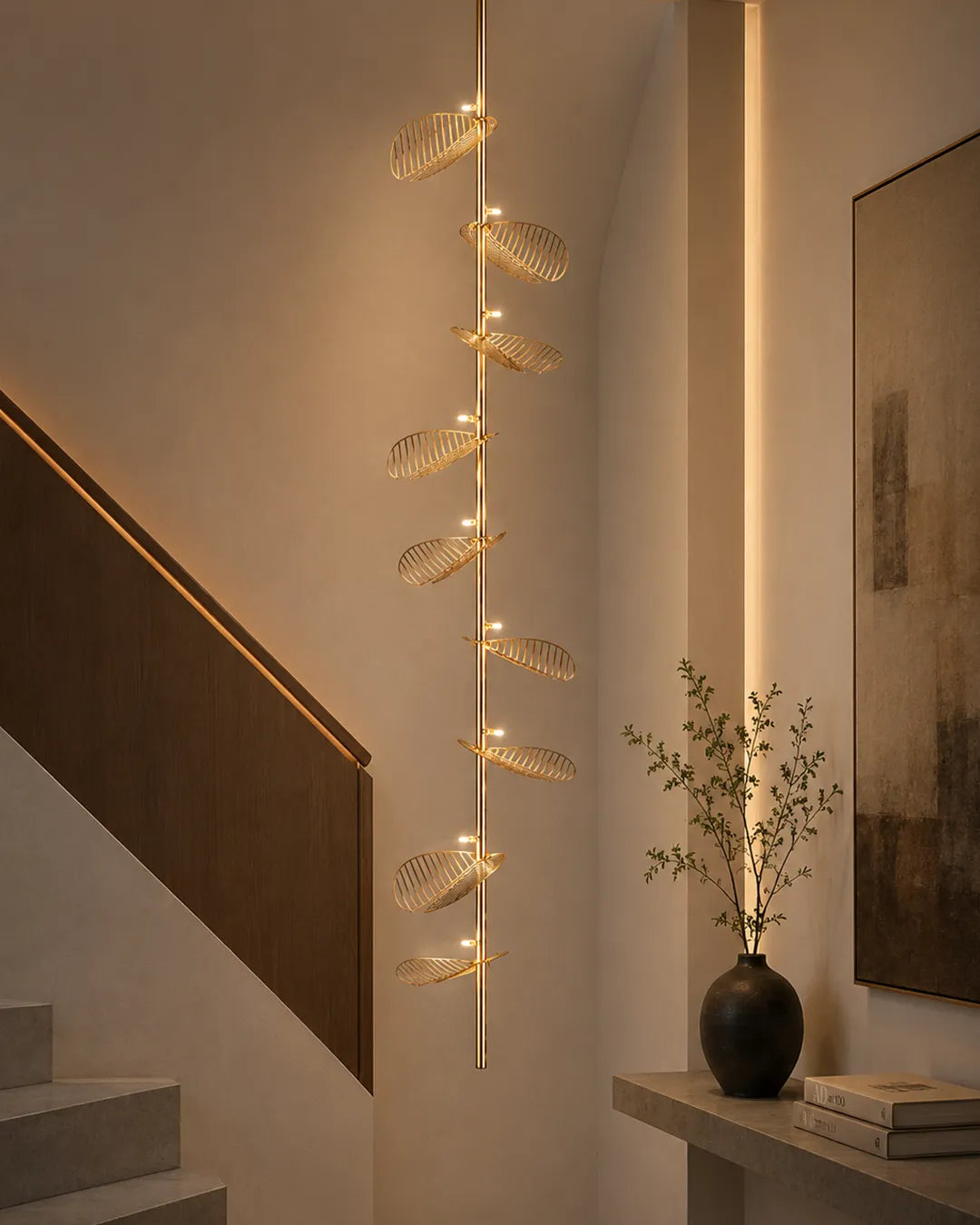 Serenity Pendant in a styled interior, pendant with leaf forms borrowed from nature | دلاية سيرينيتي، داخل مساحة منسقة، أوراق بتشطيب ذهبي
