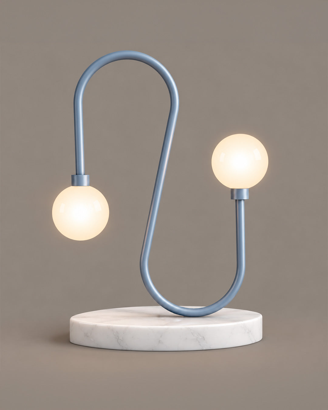 Naja Table Lamp with a curved blue-grey frame, twin light globes and a pale round base | أباجورة ناجا بخط أزرق رمادي منحني وكرتين مضيئتين وقاعدة فاتحة