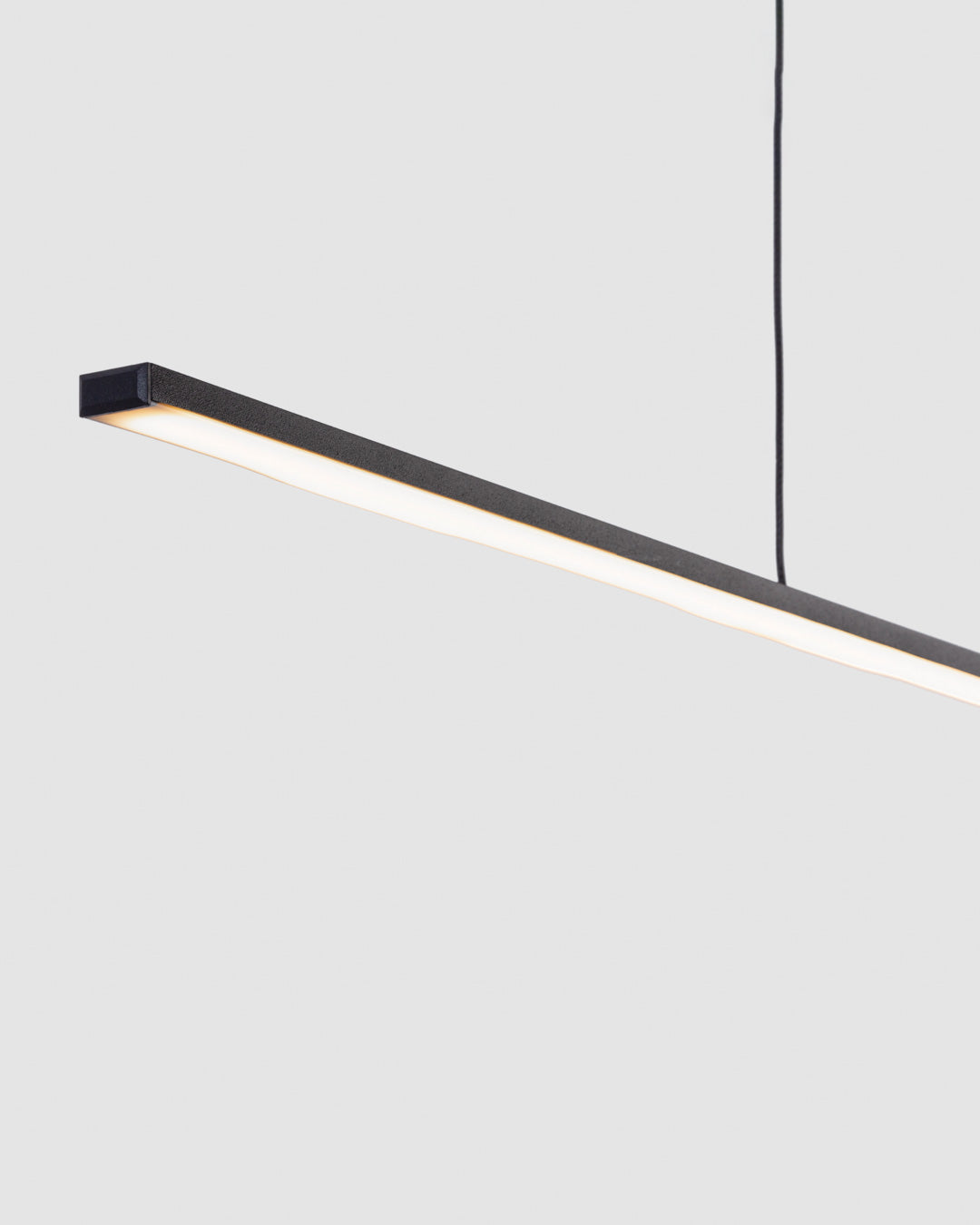 Lines horizontal pendant light with slim linear design providing warm ambient lighting / إضاءة معلقة أفقية بتصميم خطي أنيق تضيف إضاءة دافئة ولمسة عصرية