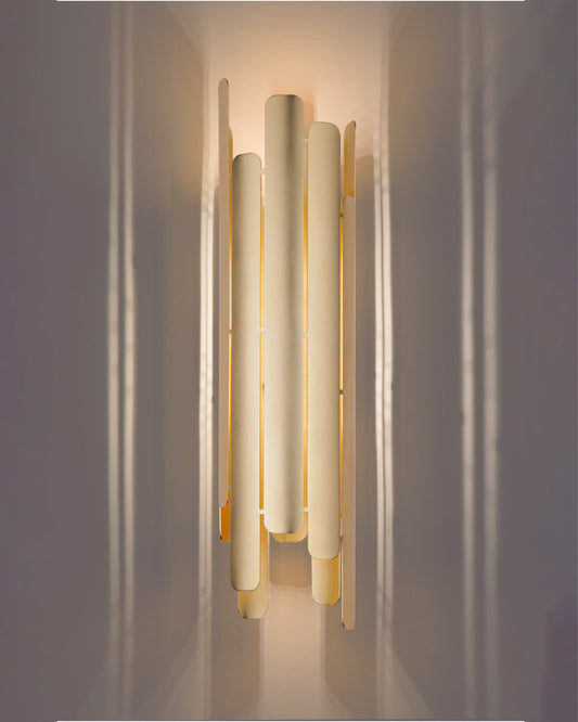 Tempo wall lamp with rhythmic sculptural design casting soft indirect light / مصباح حائط بتصميم إيقاعي نحتي يبعث إضاءة غير مباشرة ناعمة