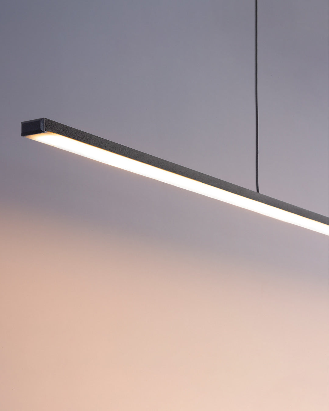 Lines horizontal pendant light with slim linear design providing warm ambient lighting / إضاءة معلقة أفقية بتصميم خطي أنيق تضيف إضاءة دافئة ولمسة عصرية