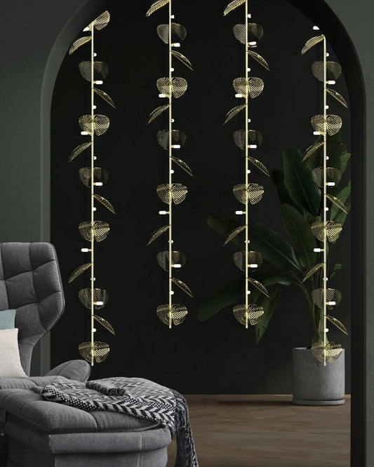 Serenity pendant light with single branch leaf inspired design emitting warm ambient light / إضاءة معلقة بتصميم مستوحى من غصن طبيعي وأوراق ناعمة توفّر إضاءة دافئة ومريحة