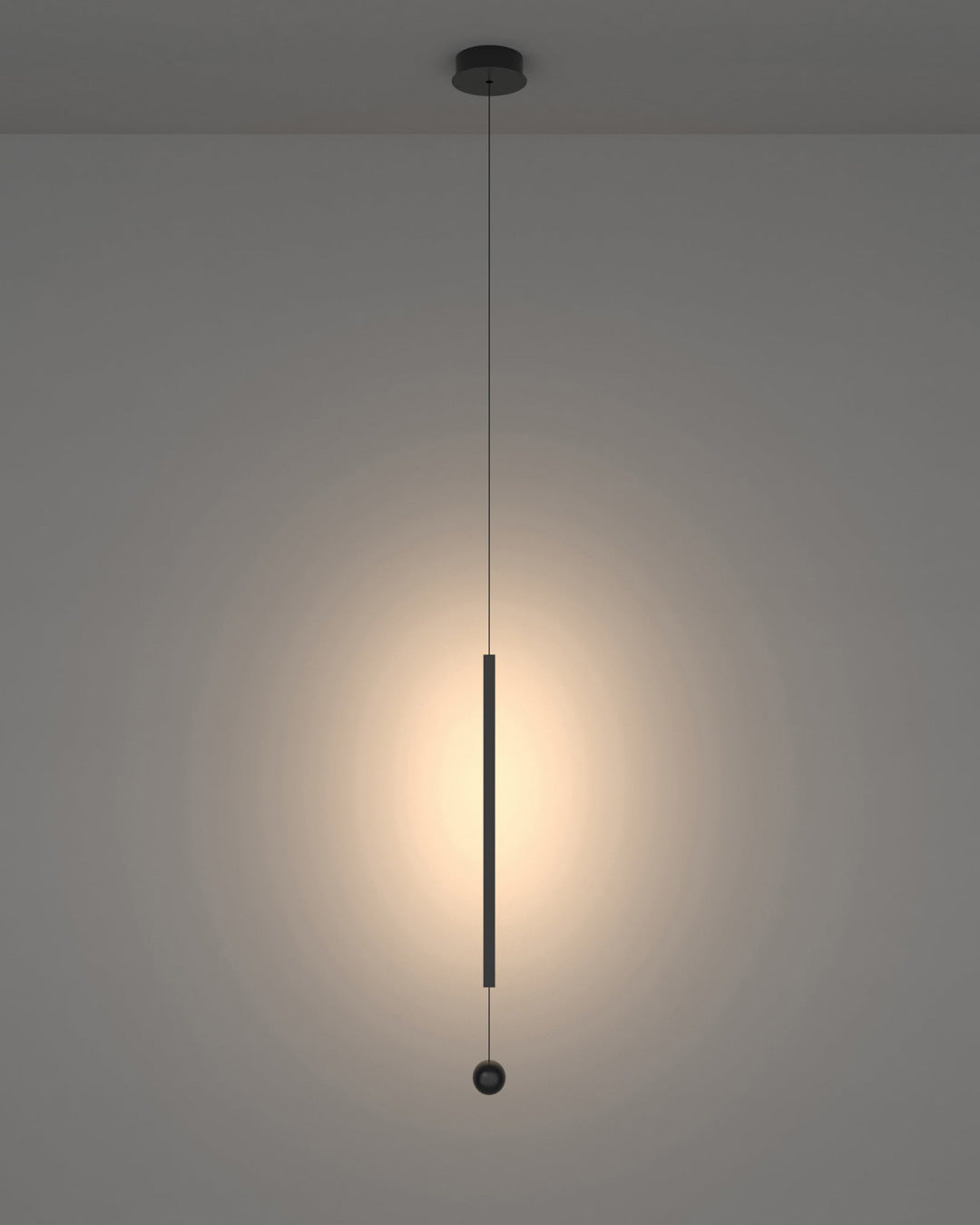 Lines pendant light with slim vertical black design creating warm ambient lighting / إضاءة معلقة بتصميم خطي نحيف باللون الأسود تضيف إضاءة دافئة ولمسة عصرية