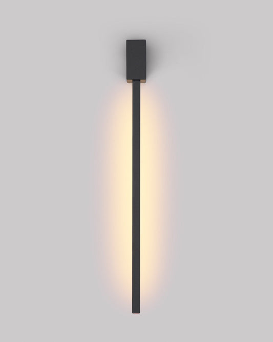 Black square wall lamp with linear design casting soft indirect light / مصباح حائط أسود مربع بخطوط هندسية يبعث إضاءة غير مباشرة ناعمة