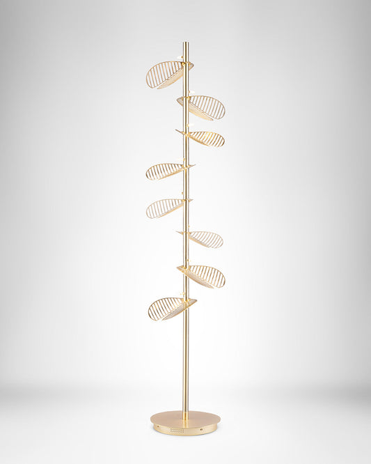 Serenity floor lamp with leaf inspired sculptural design casting warm ambient light / مصباح أرضي بتصميم مستوحى من الأوراق الطبيعية يوفّر إضاءة دافئة وهادئة