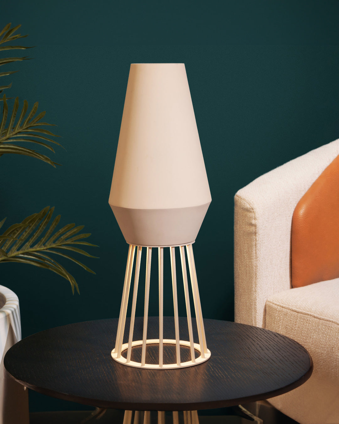 Beam table lamp casting artistic light shadows on a modern interior / مصباح طاولة بتصميم عصري يصنع ظلالًا فنية أنيقة داخل المساحات الداخلية