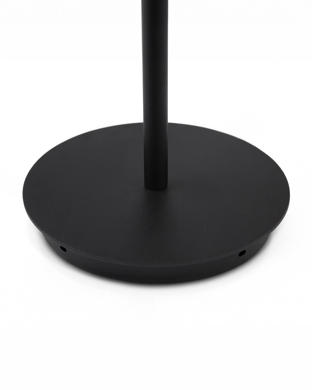 Dip floor lamp with sleek vertical stainless steel design casting warm ambient light / مصباح أرضي بتصميم طولي أنيق من الستانلس يوفّر إضاءة دافئة وعصرية