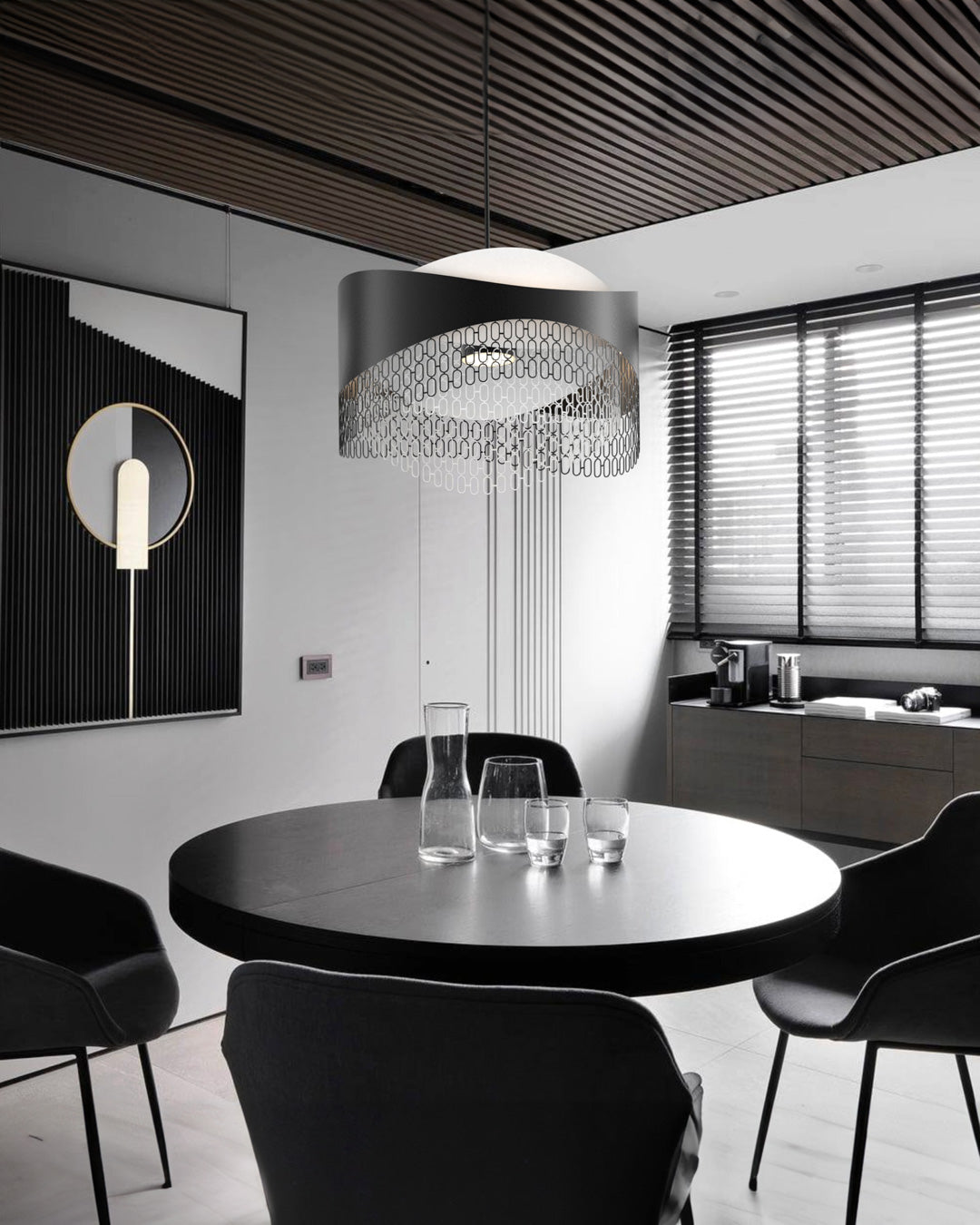 Chains pendant light with interconnected sculptural elements creating dramatic ambient lighting / إضاءة معلقة بعناصر مترابطة بتصميم فني تخلق إضاءة محيطية جريئة