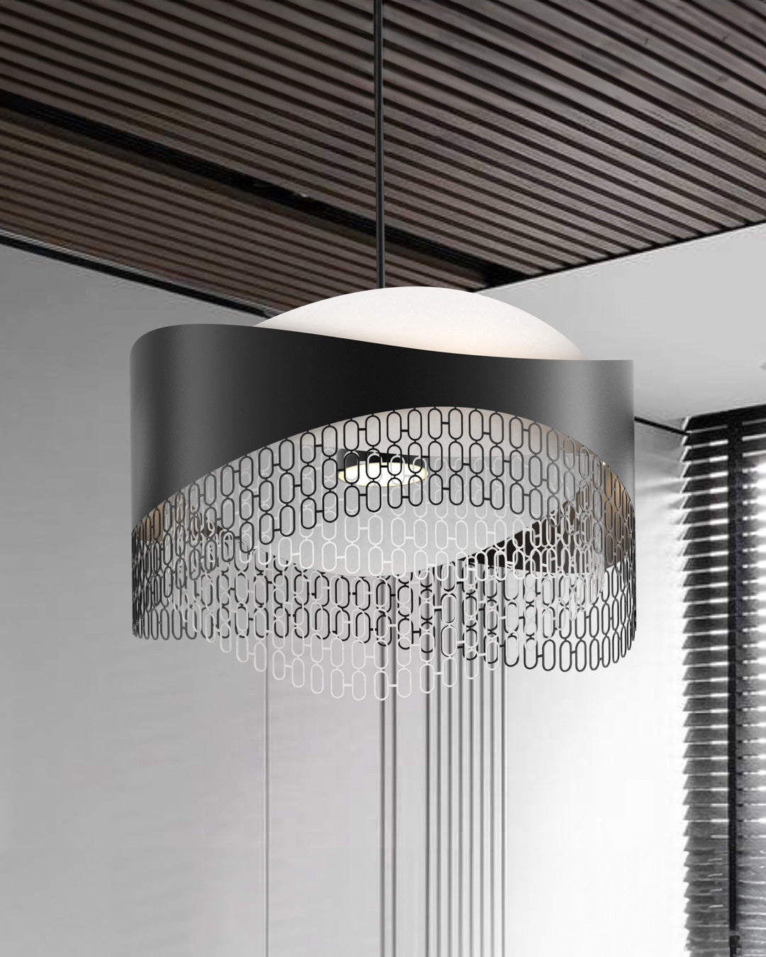 Chains pendant light with interconnected sculptural elements creating dramatic ambient lighting / إضاءة معلقة بعناصر مترابطة بتصميم فني تخلق إضاءة محيطية جريئة