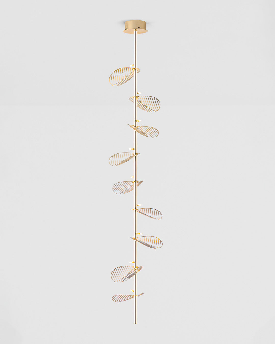 Serenity pendant light with single branch leaf inspired design emitting warm ambient light / إضاءة معلقة بتصميم مستوحى من غصن طبيعي وأوراق ناعمة توفّر إضاءة دافئة ومريحة
