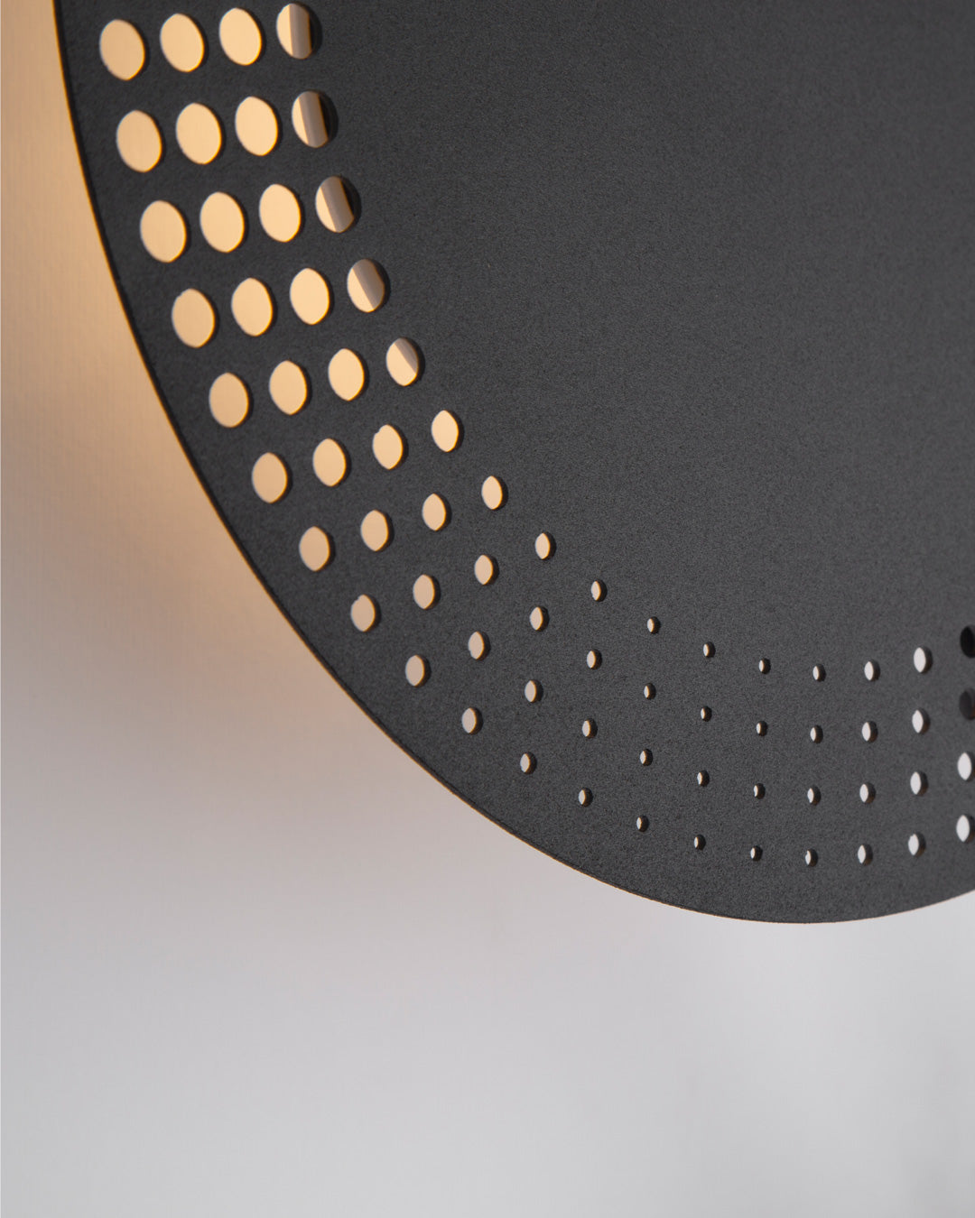 Trio wall lamp with three circular elements creating soft ambient light / مصباح حائط بثلاث دوائر متناسقة يبعث إضاءة ناعمة بطابع عصري