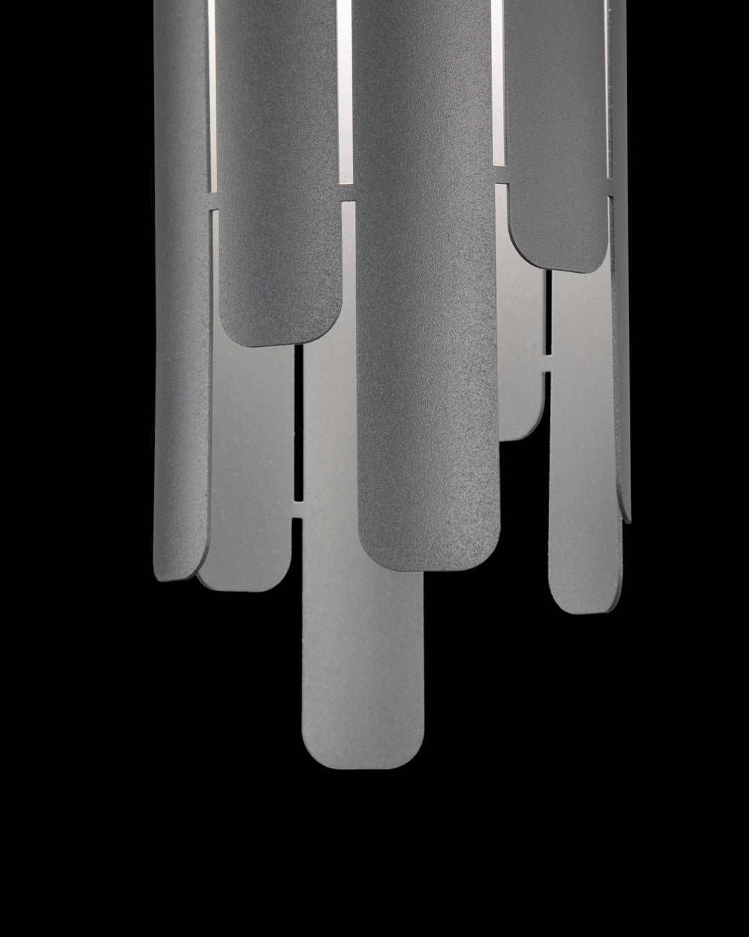 Tempo pendant lamp with vertical sculptural form providing warm ambient light / مصباح معلق تيمبو بتصميم نحتي عمودي يوفّر إضاءة محيطية دافئة