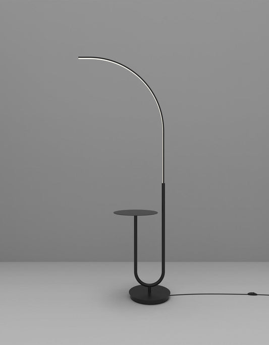 Curve floor lamp with sleek curved silhouette providing soft ambient lighting – مصباح كورف أرضي بتصميم منحني أنيق يمنح إضاءة محيطية ناعمة